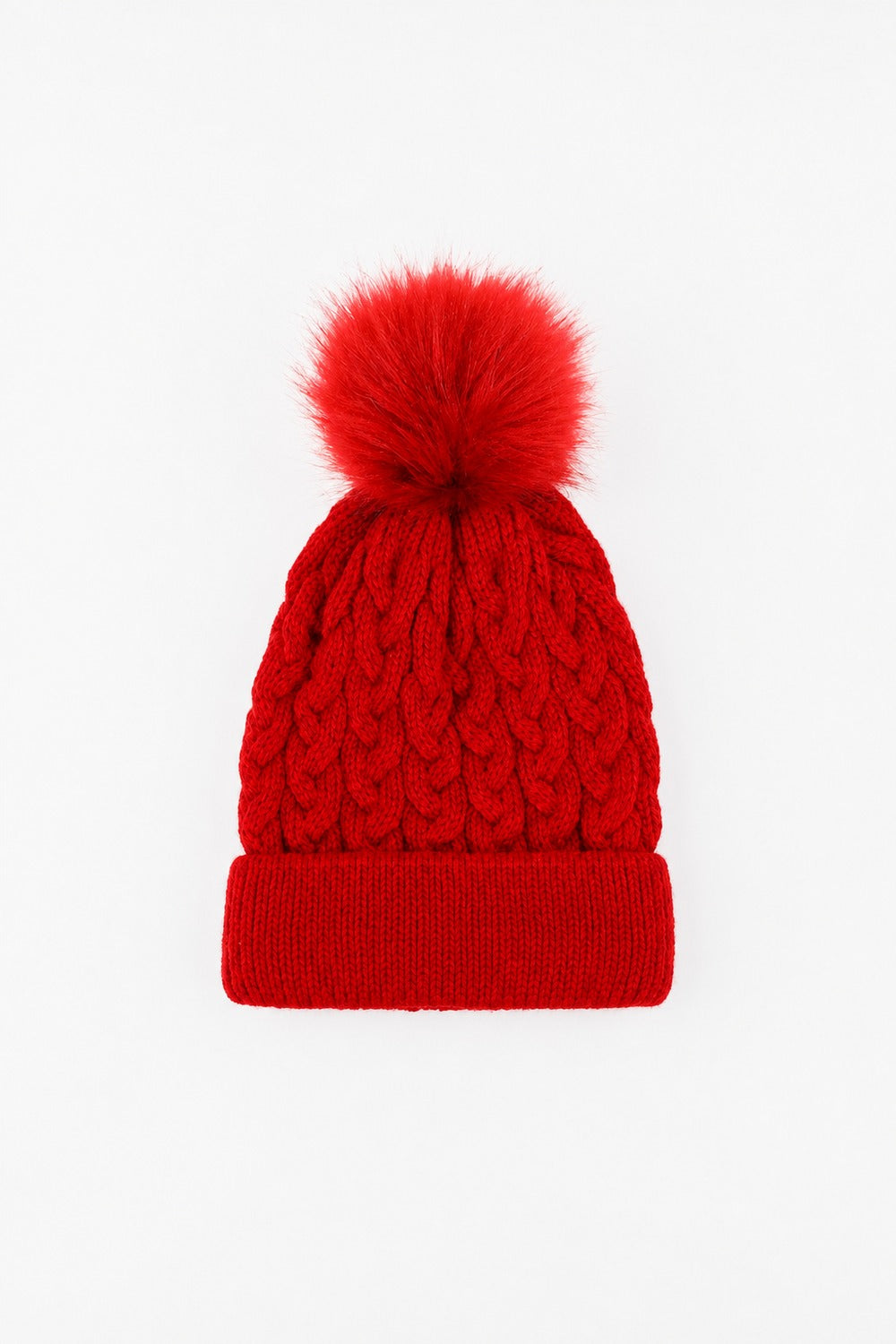 gebreide muts met pompon in rood